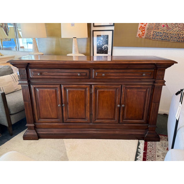 Design Plus Gallery presents a Sideboard from the 1990's by Alexander Julian At Home for Universal Furniture. The...