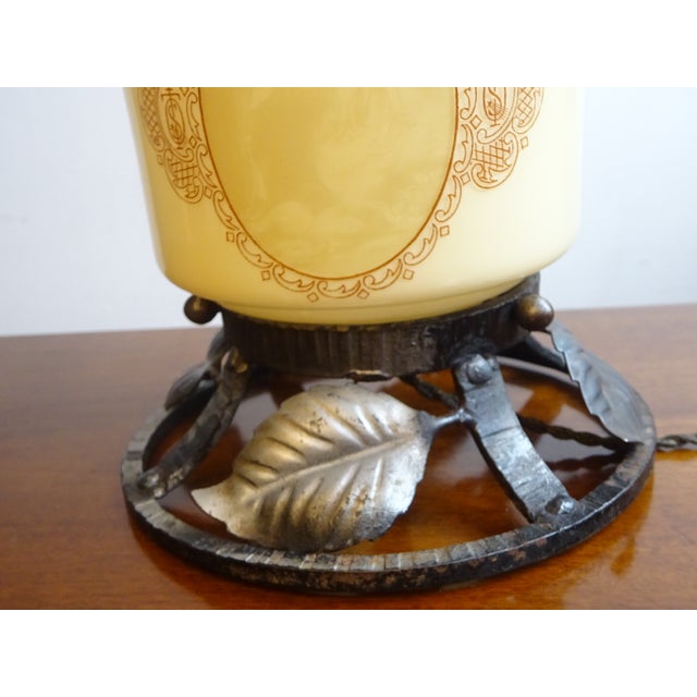 Small lamp, 18 cm tall, a nightlight that diffuses a soft, diffused light. Beige opaline glass shade depicts Jesus and...