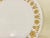 A set of thirteen Corelle brand dinner plates in the pattern "Butterfly Gold", 1970s. Each features a smooth, round shaped...