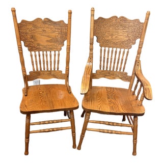 Vintage Carved Solid Oak Pressed-Back Dining Chairs – Captain & Side Chair Pair For Sale