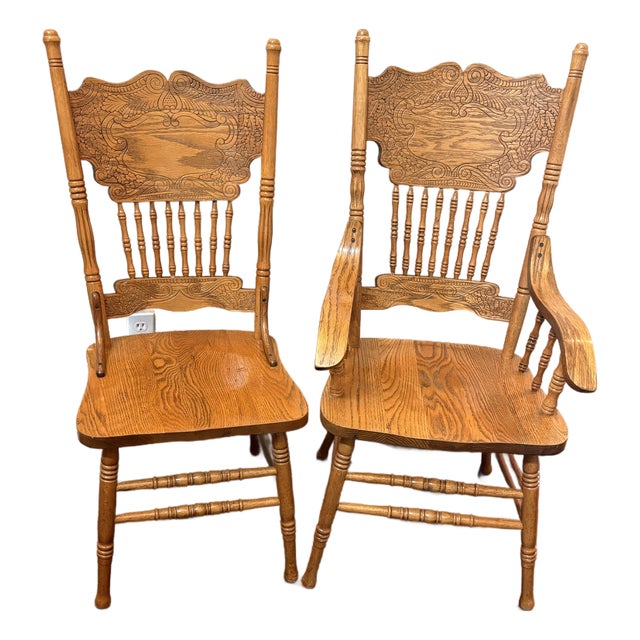 Vintage Carved Solid Oak Pressed-Back Dining Chairs – Captain & Side Chair Pair For Sale