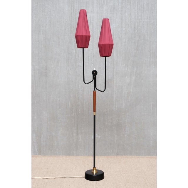 This rare floor lamp was produced by Möllers Armaturer in Eskilstuna, Sweden, in the 1950s. The lamp is marked with the...