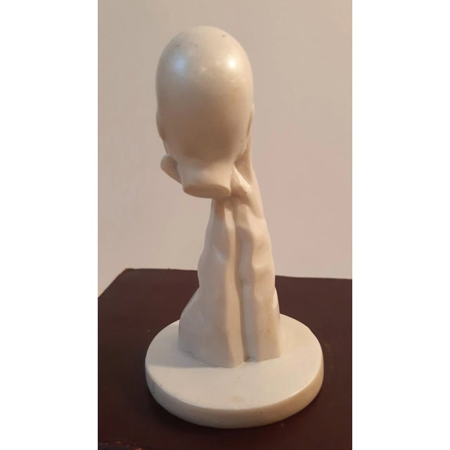 Introducing a captivating miniature sculpture that embodies modern abstract vibes! This all-white figurine features hands...