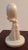 Introducing a captivating miniature sculpture that embodies modern abstract vibes! This all-white figurine features hands...