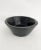 Artisan carved teak wood bowl with beautiful grain that shows through the black finish. Thick walls taper down to a solid...