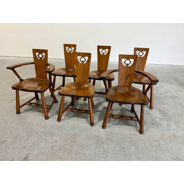 Vintage Scandinavian Brutalist Oak Dining Chairs, Set of 6. A fantastic and unusual set, two arms chairs and four matching...