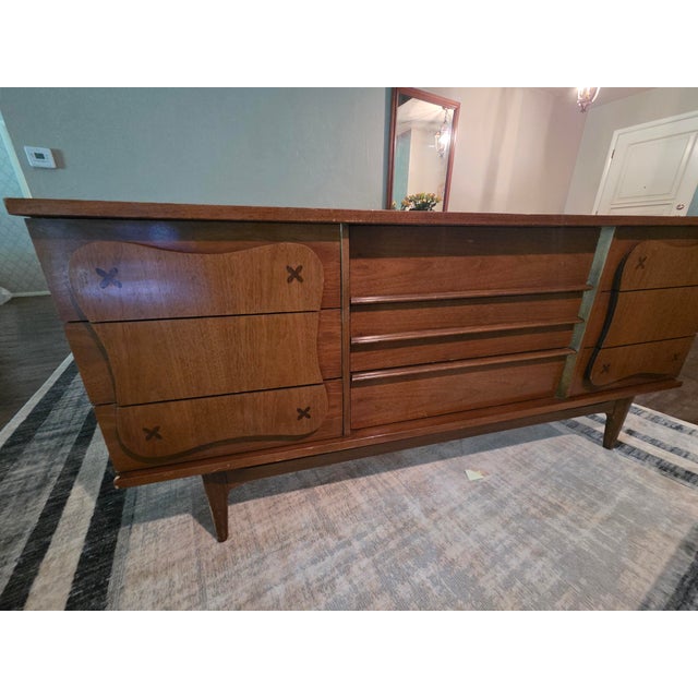 Rare and highly desirable Bassett Furniture “Monterey” 9-drawer lowboy dresser designed by Leo Jiranek, produced for only...