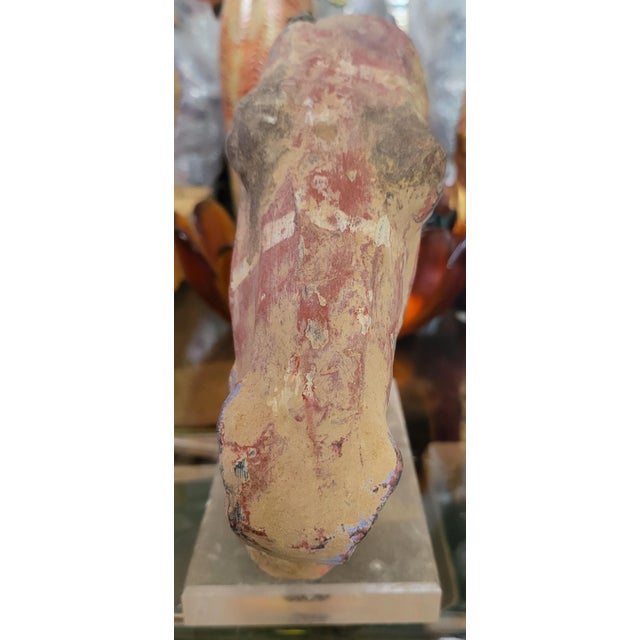 Rare Chinese Han Dynasty Painted Pottery Horse HeadPeriod: Han Dynasty (206 BCE – 220 CE) Material: Terracotta / Unglazed...