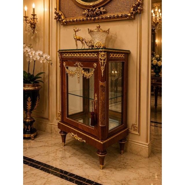 Introduce timeless French elegance into your home with this exquisite Louis XVI style vitrine cabinet, crafted from rich...