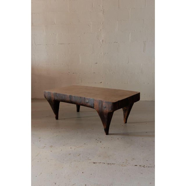 26-01 spruce side table by timothée musset unique dimensions: d 126 x w 68 x h 45 cm materials: spruce and burnt wood as a...