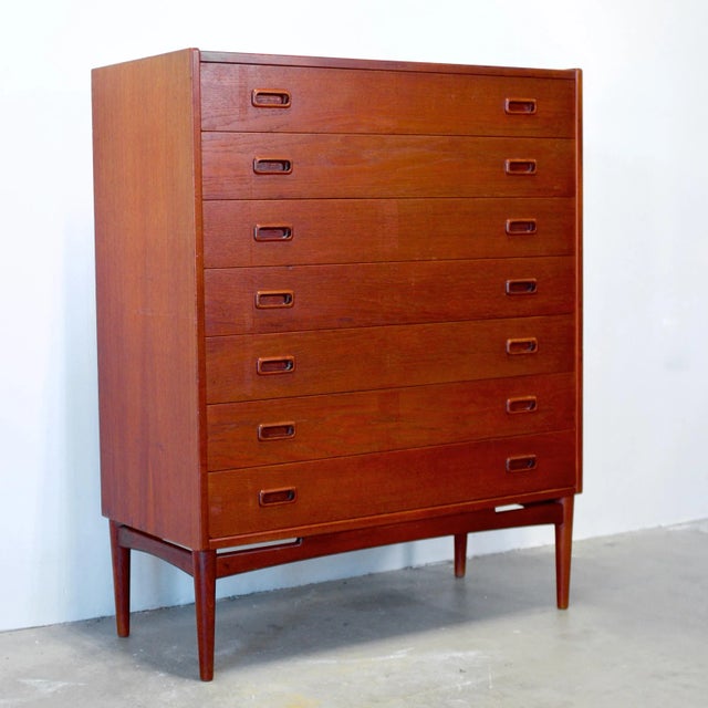 Dimensions: 36 1/4” L x 15 3/4” D x 44 3/8” H Origin: Denmark Designer: Arne Hovmand-Olsen Manufacturer: Mogens Kold...
