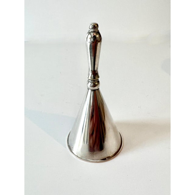 A wonderful little Silver Plate bell. Probably more of a decorative piece, but works well. Could be used while taking care...