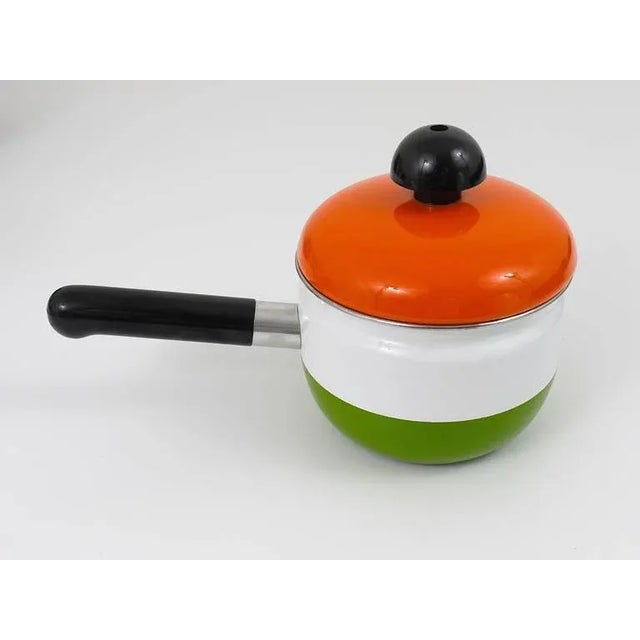 A very beautiful enameled pot with lid, designed by Carl Aubock Vienna. Executed by Riess, Austria, 1970s. Diameter...