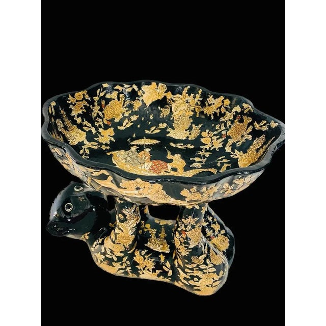 A gorgeous antique Monkey holding a bowl, a superb looking very detailed black with gilded flowers designed and a couple...