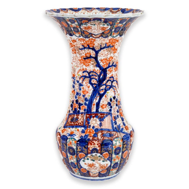 A pair of antique Japanese “Imari” porcelain vases. From the Meiji Period (1868-1912). Baluster form, scalloped gilt-...