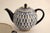 Authentic hand-painted porcelain tea set in the cobalt blue lattice weave pattern with 22 karat gold accents and rims....