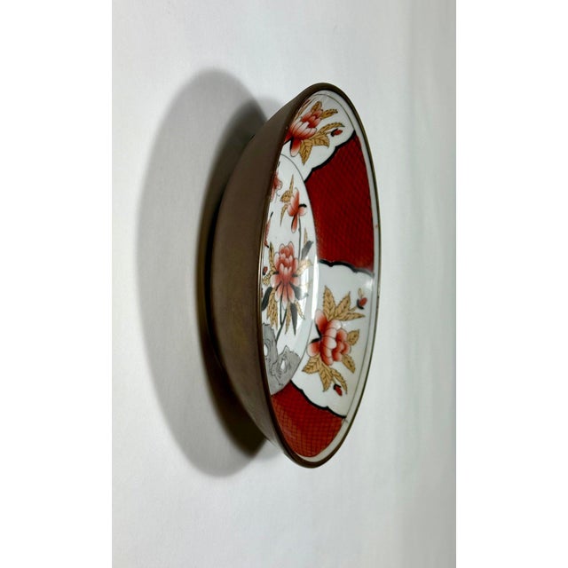 Vintage Mid-Century Chinese Brass-Encased Hand-Painted Porcelain Bowl A quintessential piece of Mid-Century Chinoiserie,...