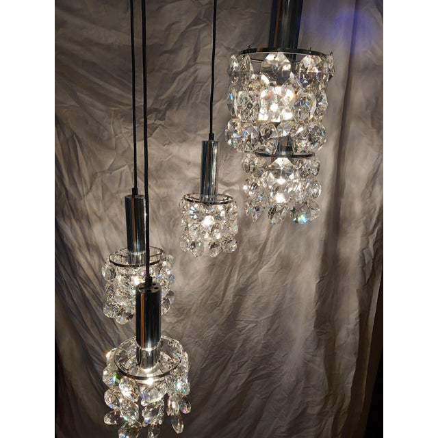 This lead crystal cascade lamp is equipped with 5 E27 sockets and is fully functional. The length can be customized or...