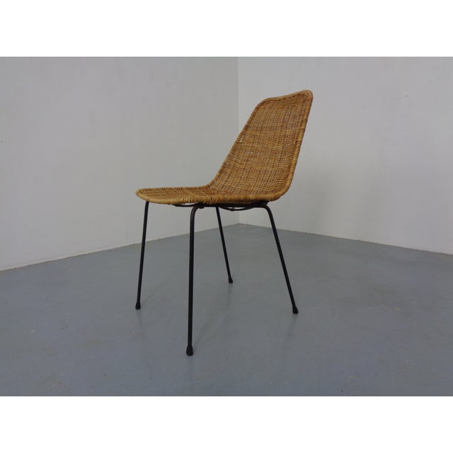 Rattan chair by Gian Franco Legler from the 1950s. I have official proof of authenticity such as vintage catalogs,...