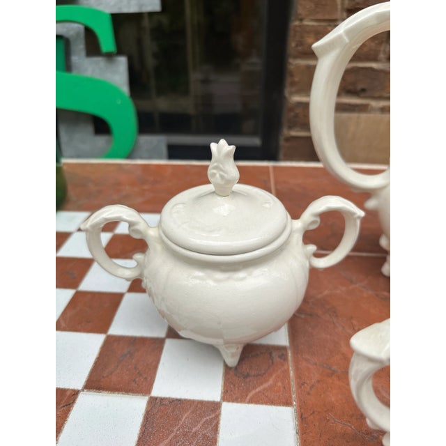 Up for consideration is a beautiful white ceramic three piece tea set. This would look lovely in your home and it is a...