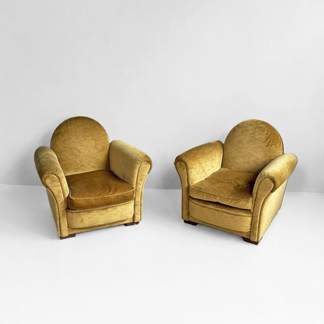 Italian mid-century modern yellow velvet armchairs by Tito Agnoli for Poltrona Frau, 1950s Fully upholstered armchairs...