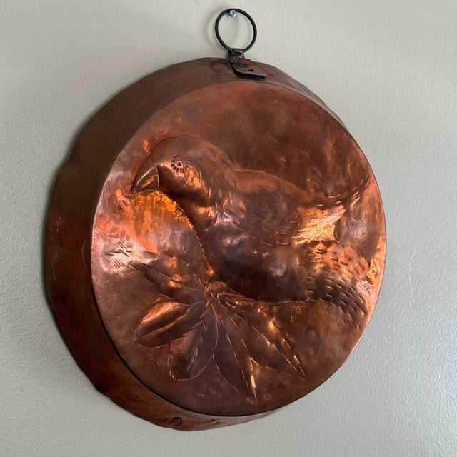 A large vintage copper bird mold with warm hammered tone, a charming French-country kitchen wall hanging. Most items found...