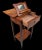 This early 19th-century Louis XVI French Marquetry Ladies Game, Desk, and Dressing Table is a unique piece that combines...