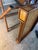 Lovely vintage folding tray table constructed with a faux bamboo frame and woven herringbone-patterned rattan surface....