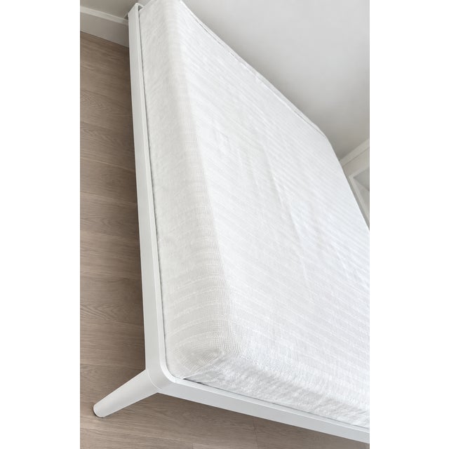 The Design Within Reach Queen White Lacquered Aluminum Min Bed frame is sleek and modern. White queen size Min Bed frame...