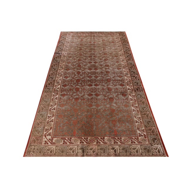 Hand knotted in quality wool, this antique 6x12 Khotan rug originates from East Turkestan circa 1920-1930. Bearing the...