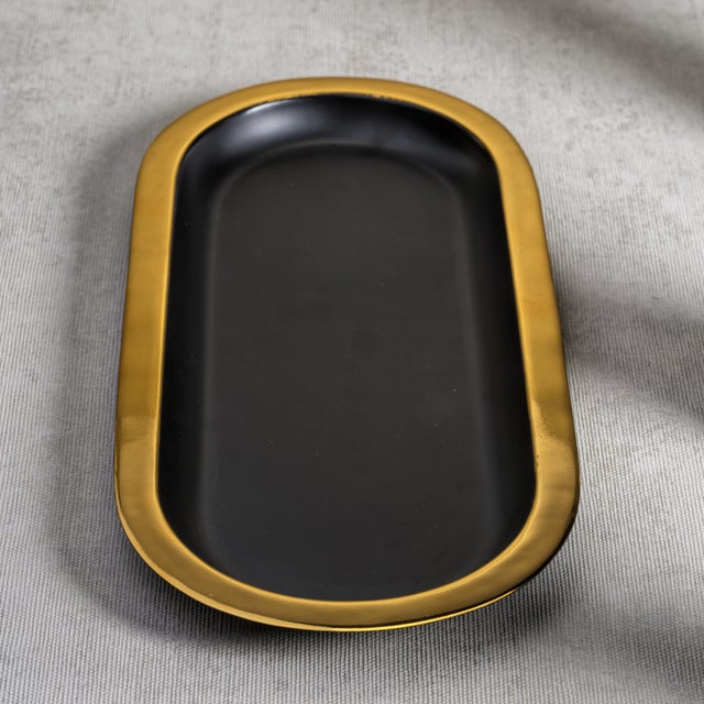This stainless steel serving tray is perfect for all your entertaining needs. An oval shaped two-tone tray that can be...