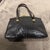 Contemporary An Elegant 1960s Vintage Dark Brown Leather and Brass Clasp Italian Hand-Bag For Sale - Image 3 of 16