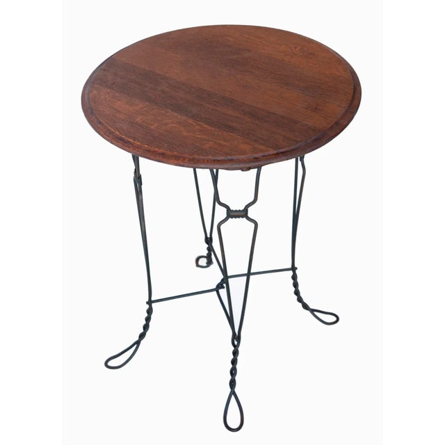 A Charming Set of 3, Antique Ice Cream Parlor Table & 2 Chairs. Made with Copper and wood on seats and table top. Chairs...