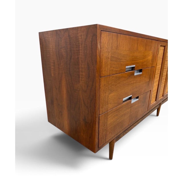 This impressive Mid-Century Modern American of Martinsville “Accord” nine-drawer dresser dates to the 1960s and features...