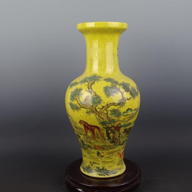 H-44cm,W-23cm. This Chinese Ceramic Vase is a rare find from the Qing Dynasty. With a Qianlong mark and a beautiful yellow...