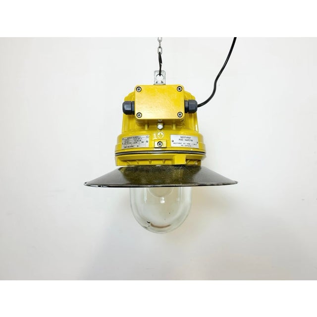 Industrial factory pendant light manufactured by elektrosvit in czech republic during the 1990s. It features a cast...