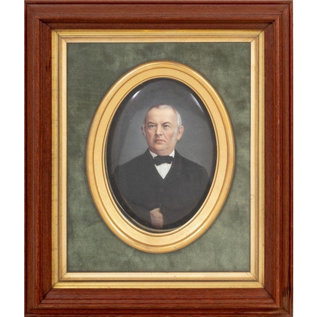 Pair of German KPM Porcelain Portrait Plaques, late 19th century, depicting a gentleman and his wife, wearing the Imperial...