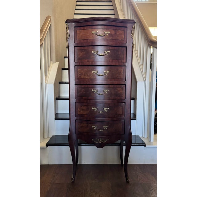 Elegant vintage French Louis XV style lingerie chest featuring six drawers and graceful curved lines. Expertly crafted...