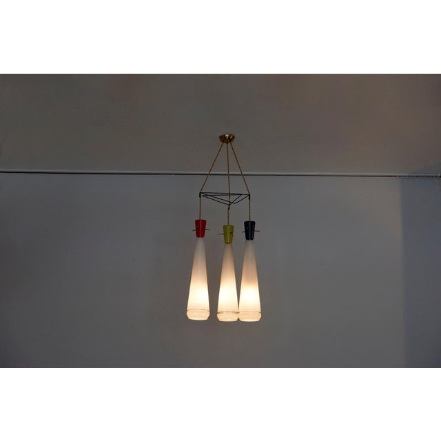 Italian ceiling lamp in brass and iron. Socket: 3x E27. Up to 250V (Europe/UK Standard).The wiring of this item may be...