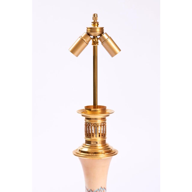 - Pair of Gothic Revival lamps - Baluster shaped in egg-shell colored opaline - Decoration of blue and red stylized...