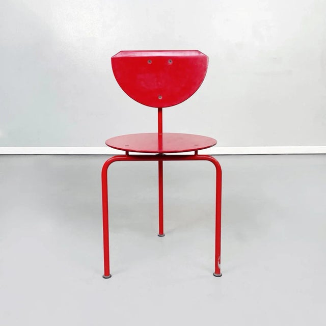 Italian mid-century red wood and metal Alien chair by Forcolini for Alias, 1980s. The Alien chair with round seat in is...