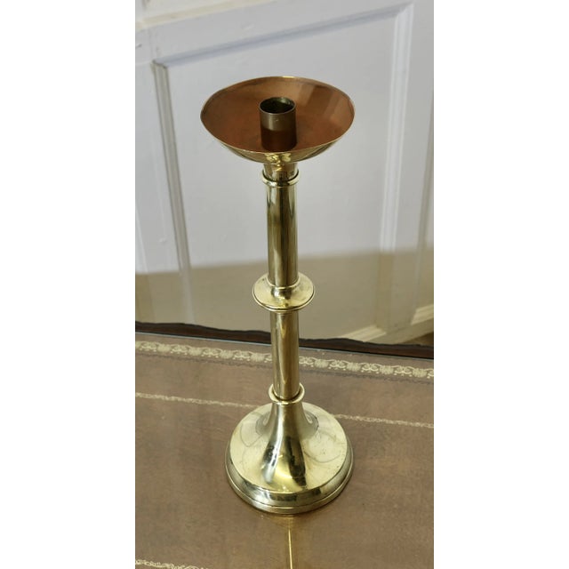 Tall Arts and Crafts Brass Candle Stick This is a large candle stick, it is 16” high and made in brass it dates from about...