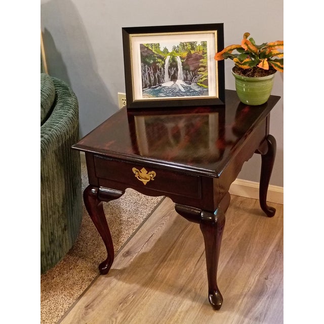Give your space a touch of classic warmth with this beautifully refinished vintage Broyhill side table. Crafted from solid...