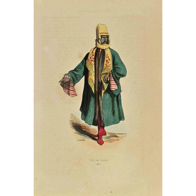 Mardin Turk is a lithograph made by Auguste Wahlen in 1844. Hand colored. Good condition. At the center of the artwork is...