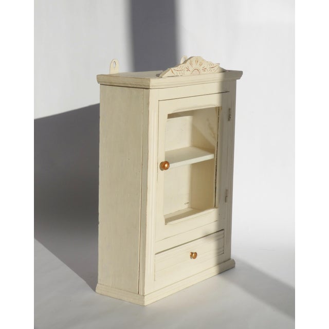 Vintage Rustic Beige Apothecary Cabinet with Glass Door, Carved Floral Ornaments, Shelf and Drawer For Sale - Image 3 of 10