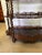 Handsome dark walnut barley twist open book case. The six shelves of variegated sizes with a functional brawer at the...