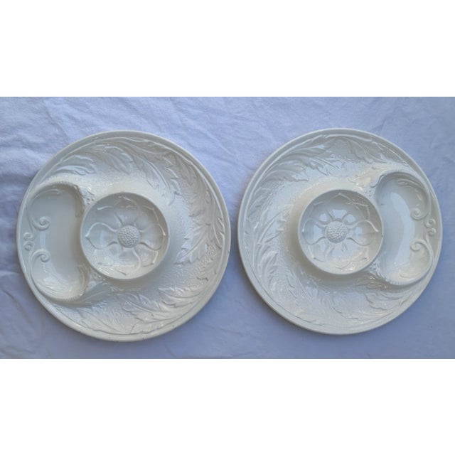 This set of Mid -Twentieth Century Majolica style white plates feature an embossed artichoke leaves and flower pattern...
