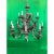 Lovely hand carved 2 tier chandelier with 12 lights featuring a scrolled acanthus leaf design in an oxidized silver gilt...