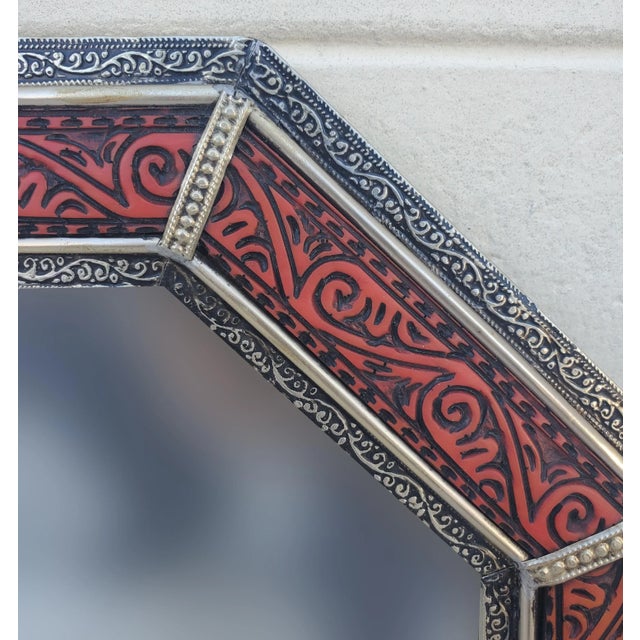 Medium size metal inlaid and resin Moroccan mirror. Made in the city of Marrakesh. Octagonal shape measuring approximately...