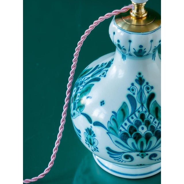 Introducing Hera, a one-of-a-kind lamp meticulously crafted from a vintage Royal Delft (De Porceleyne Fles) Delvert vase....